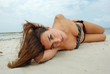 brunette in the white sand
