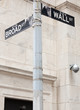 Wall Street road sign in the corner of New York Stock Exchange Wall Street road sign in the corner of New York Stock Exchange
