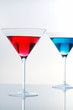 Cocktails, bitter campari and blue curacao in martini glass Cocktails, bitter campari and blue curacao in martini glass