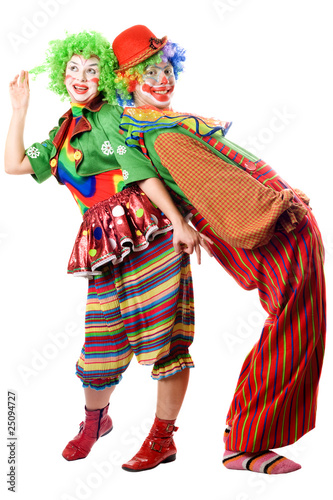 Photo: Two clowns are back to back Two clowns are back to back