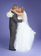 Newly-married couple kisses