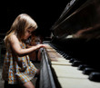 girl playing on an piano. girl playing on an piano.