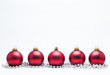 Christmas Baubles with Silver Beads on a White Background.