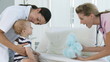Caring Hospital female personnel with a baby