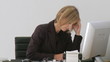 Business-woman frustrated at her computer crashing