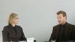 Two associates talking about business