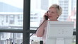 Senior businesswoman on her phone