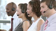 Obliging Business team talking on  headsets