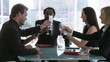 Business team celebrating success with champagne