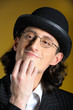 Photo: Funny man in glasses in retro suit and white shirt Funny man in glasses in retro suit and white shirt