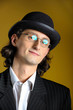 Photo: Funny man in glasses in retro suit and white shirt Funny man in glasses in retro suit and white shirt