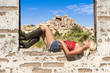 Country girl resting on window sill Country girl resting on window sill