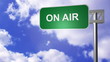 on air signpost on the road