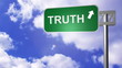 Signpost on the road showing truth Way