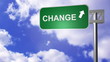 signpost on the road announcing change way