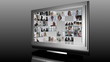 Television screen showing a collage of business footage