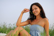 girl sitting on green grass