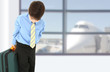 Boy in Suit at Airport