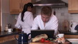 young couple cooking together