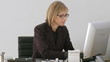 Business-woman frustrated at her computer crashing