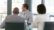 young businessteam laughing during a meeting