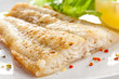 Fish dish - fried fish fillet with vegetables Fish dish - fried fish fillet with vegetables