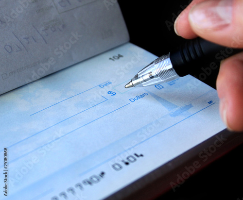 Photo : writing a check writing a check