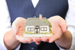 Little house in womans hands