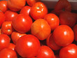 Tomatoes in baskets at the farm stand Tomatoes in baskets at the farm stand