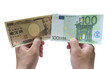 10,000 yen and 100 euro