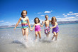 Ethnically diverse Children Playing at the Beach Ethnically diverse Children Playing at the Beach