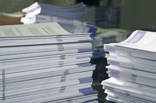 Photo: Handout Paper Piles Handout Paper Piles