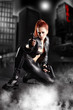 beautiful sexy girl holding gun . smoke background