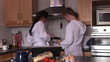 young attractive couple making breakfast