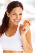 Health concepts - Young woman with an apple
