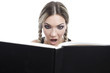 young pretty girl reading a book