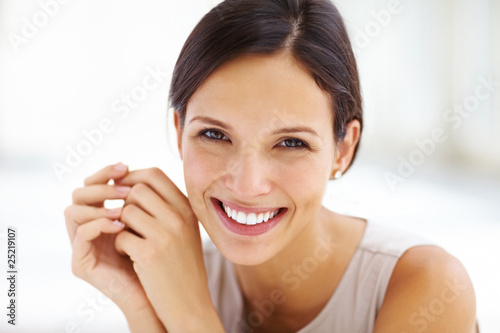 Photo: Closeup portrait of an attractive young woman Closeup portrait of an attractive young woman
