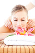 Relaxed bright woman enjoying a back massage