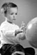 white child spinning globe white child spinning globe