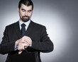 Businessman looking at his watch