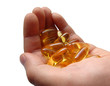 Handful of Omega-3 capsules