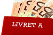 livret d'épargne A et billets de cinquante euros, fond blanc livret d'épargne A et billets de cinquante euros, fond blanc