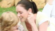 loving mother with son in the garden