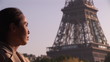 woman relaxing with Eiffel tower on the background