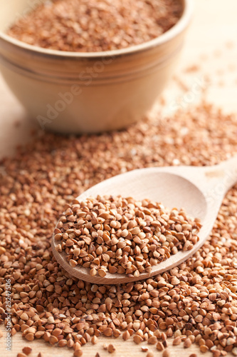 Photo: buckwheat in wooden spoon buckwheat in wooden spoon