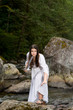 Young girl in white dress with two handed sword Young girl in white dress with two handed sword