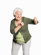 Mature woman in fighting gesture isolated against white