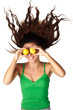 Beautiful woman hold lemons near eyes hair dishevelled isolated Beautiful woman hold lemons near eyes hair dishevelled isolated