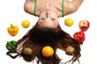Beautiful woman lying with fruits hair is dishevelled isolated Beautiful woman lying with fruits hair is dishevelled isolated