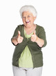 Happy mature woman showing thumbs up isolated against white